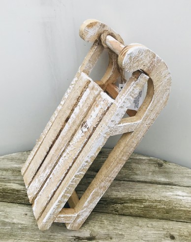 Dekorativer Holzschlitten